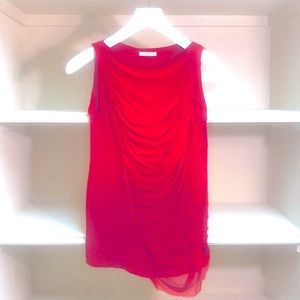 A red silk top for casual to semi-formal gathering
